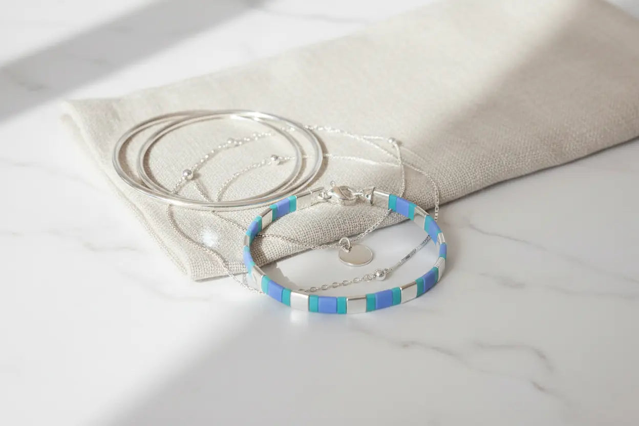 Azure Pulse Tila bracelet from Gem N Glow by Natali featuring vibrant blue beads and intricate silver accents.